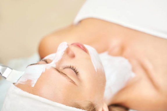 a patient receiving a tca chemical peel treatment
